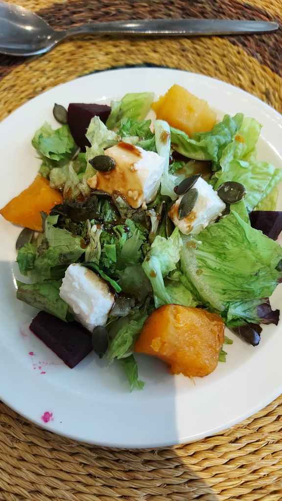 delicious salad with feta pumpkin seeds lettuce and beetroot